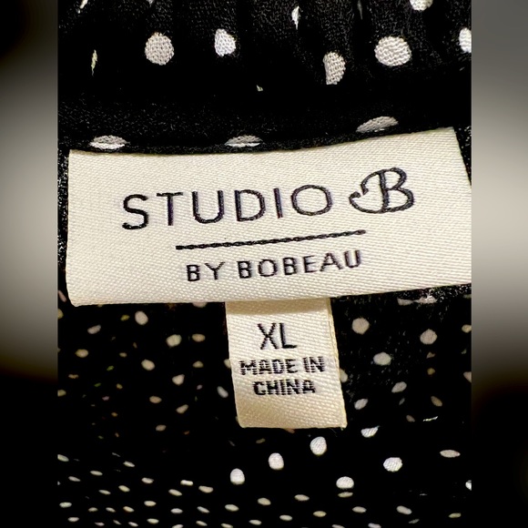 Spotted short sleeve blouse. Semi-sheer. - Picture 2 of 3